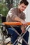 Man on wheelchair preparing iron board