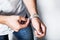 Man in white shirt and metallic wrist watch