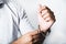 Man in white shirt and metallic wrist watch