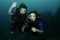 Man and wife scuba diving