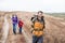 Man with wife and son backpacking