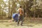 Man in the wild outdoors camping. Hiking man with backpacks come back from trekking. Camping in a forest. Rugged man travel alone