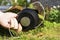 A man winds a new bobbin on a mowing trimmer