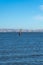 A man windsurfing at Palo Alto Boat Launch, California , USA