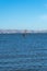 A man windsurfing at Palo Alto Boat Launch, California , USA