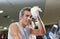 Man Wiping Sweat With Towel At Health Club