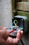 Man wiring an electric socket using an electrical screwdriver