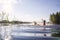 A man and a woman bathe and have fun in a clean, forest lake, on a hot, summer day. Active tourist life