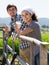 Man and woman chatting and enjoying milk outdoors