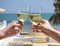 Man and woman clanging wine glasses with white wine