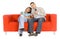 Man And Woman On Couch Watching Television