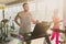 Man and woman, couple in gym on treadmills