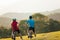 Man and woman couple road cycling on race bike