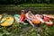 A man and a woman, a couple sitting on a raft, waiting for rafting on the river. Extreme recreation, tourism and vacation. Group
