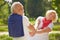 Man and woman dancing together in a garden