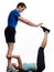 Man and woman doing abdominals workout push ups