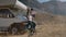 Man and woman drinking coffee and talking while traveling by camper in countryside rbbro.