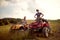 Man and woman driving off-road and enjoying on extreme riding