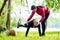 Man and woman at fitness training doing push-ups