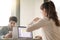 Man and woman having business lunch, coffee break while working