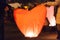 Man and woman holding a Chinese lantern