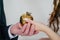 Man and woman holding golden apple in their hands as a sign of love, modern Adam and Eve, wedding day