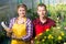 Man and woman keep records of plants in the