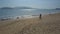 Man woman kiss on beach against endless ocean