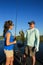 Man and Woman Large Mouth Bass Fishing in Boat