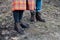 Man and woman in leather heavy duty boots