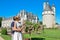 Man and woman looking at the castle Chenonceau Medieval Chateau in France