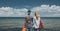 Man and Woman Looking At Sea Friends Travel Holiday Adventure Together Concept