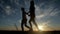 Man and Woman love silhouette in sunset, love concept