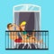 Man and woman married couple sunbathe on the balcony relaxing at home in the sun in bathing suits