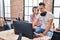 Man and woman musicians listening to music composing song at music studio