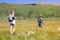 Man and woman in nature hiking in summer