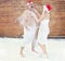 Man and woman refresh in snow after hot sauna.Concept of: relax, vacation,healthy lifestyle.