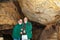 A man and a woman of retirement age on an excursion to the Kizil Koba cave. Republic of Crimea