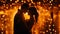 A man and a woman share a romantic kiss while rain pours down around them, A couple dancing under glittering city lights