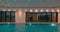 Man and woman swimming in the indoor pool