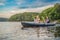 Man and woman swims on kayak in the sea on background of island. Kayaking concept.Kayaking concept with family of father