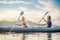 Man and woman swims on kayak in the sea on background of island. Kayaking concept.Kayaking concept with family of father