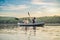 Man and woman swims on kayak in the sea on background of island. Kayaking concept.Kayaking concept with family of father