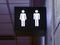 Man and woman toilet sign in public space. Female and male symbols for comfort room. Public toilet sign