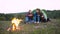 Man And Woman Traveling With Dog At Camp