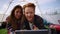 Man and woman using digital tablet. Couple waving hands during online video call