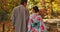 Man, woman and walking in forest with date in nature park, back of couple in traditional clothes in Japan. Love, care