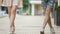 Man and woman walking simultaneously in funny way, as if dancing, happy mood