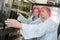 Man and woman in wine bottling factory