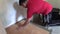 Man work at home renovation floor tiling